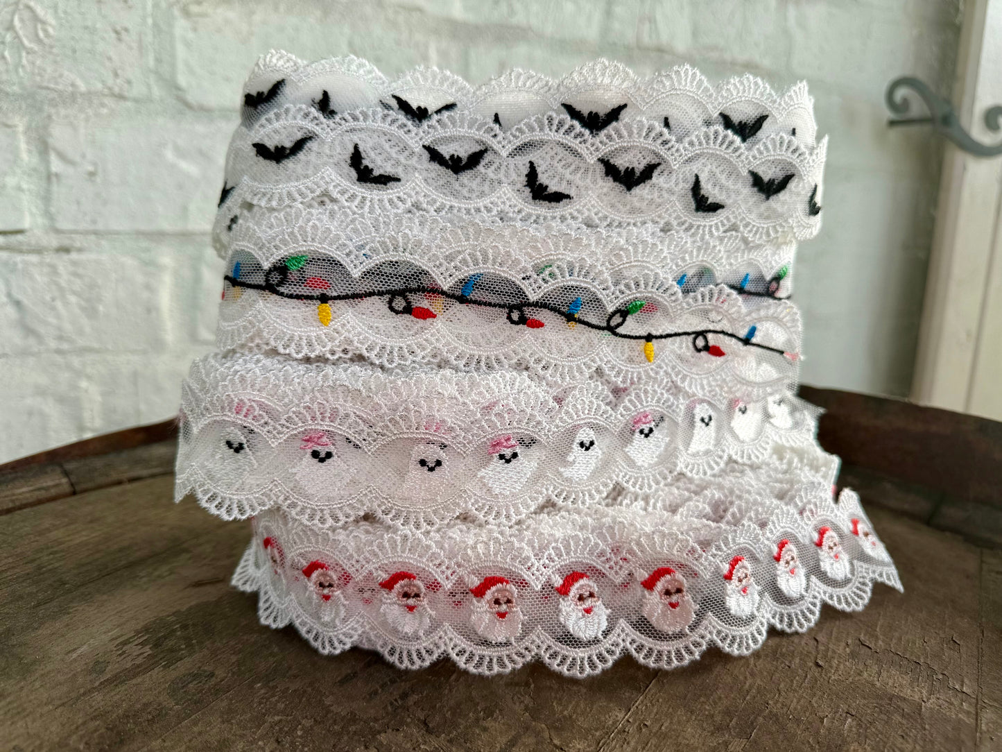 7 yds holiday lace ETA June